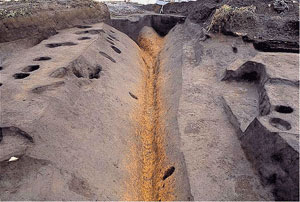 a village enclosed with a deep ditch